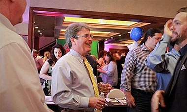 A group of people at a business event.