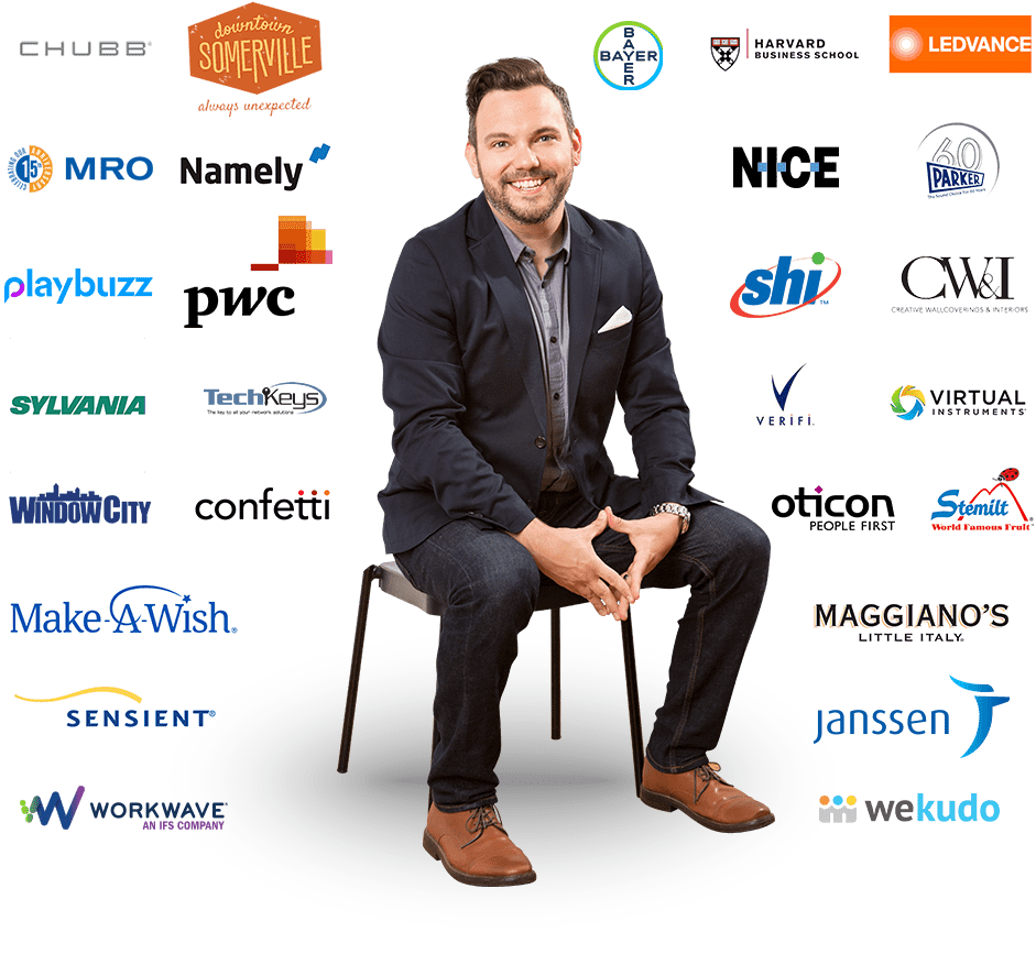 A man sitting on a chair with many different logos.