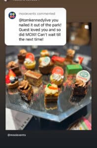 A platter of assorted bite-sized desserts is displayed, with a comment from moxieevents praising @tomkennedy, the corporate event emcee, for his engaging live performance and excellent guest reception. The desserts include various cakes adorned with Toyota logos.